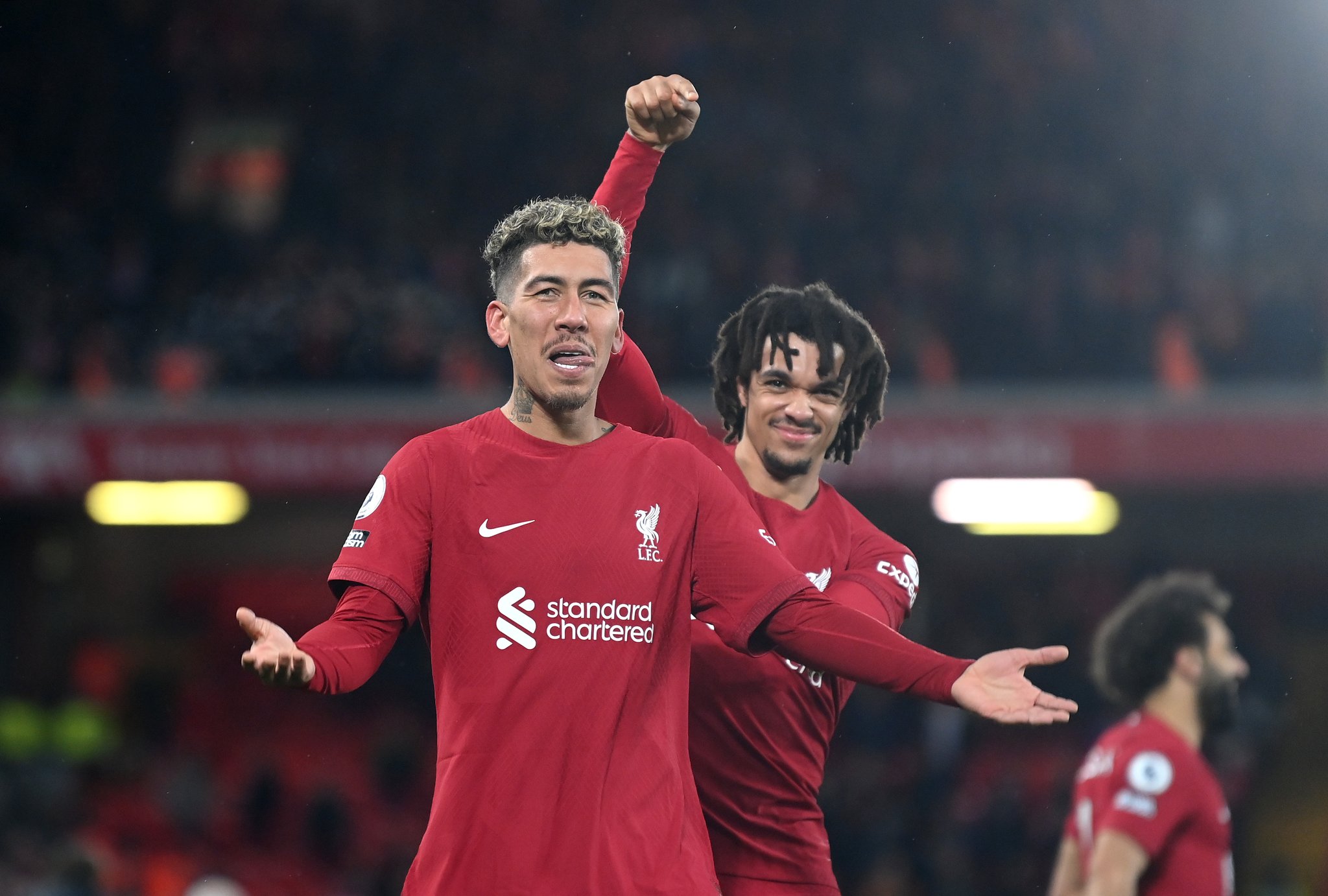 Liverpool manager Jurgen Klopp talks Roberto Firmino after exit confirmation. 