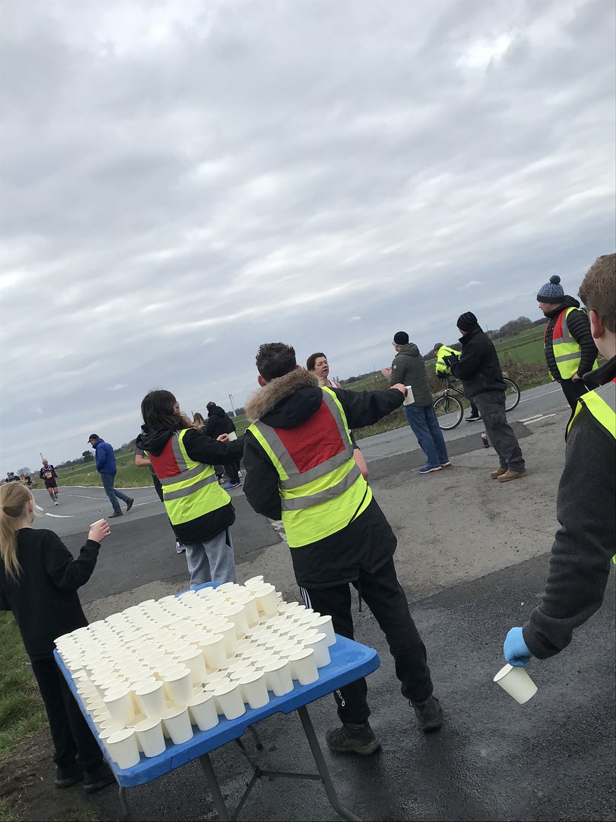 SportNLC's tweet photo. Well done to our L2 Sport and L3 Uniformed a service students who volunteered at mile 10 water station today @Tape2TapeEvents https://t.co/UOZztJs7Co