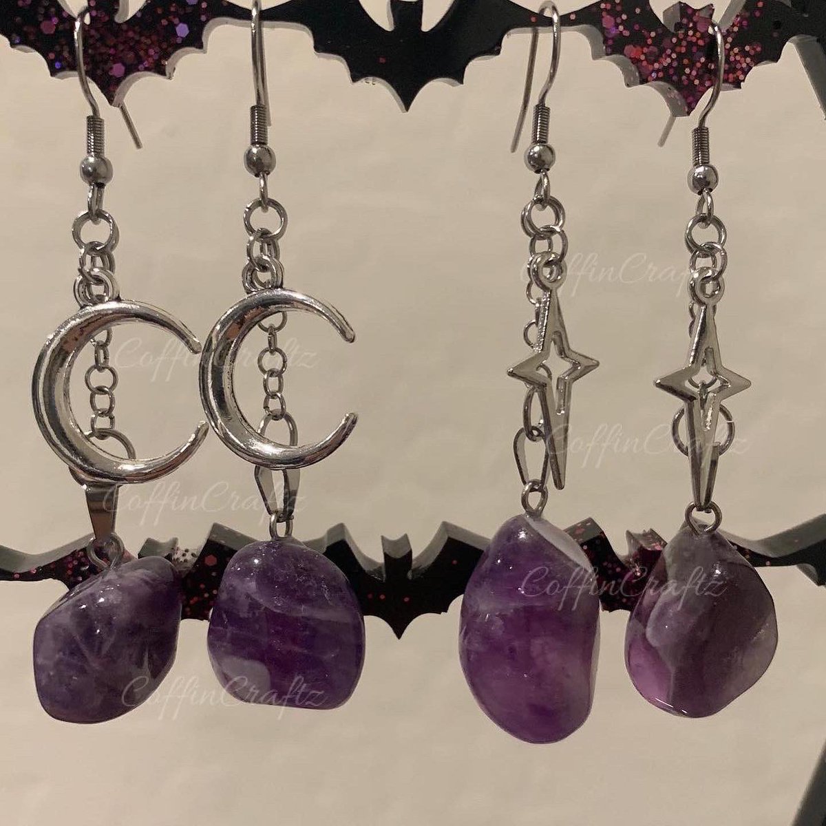 CoffinCraftz's tweet photo. Crystal earrings and Whimsigoth moss wall art decor: Purple edition 💜🖤💜 https://t.co/hZLQASQkLs