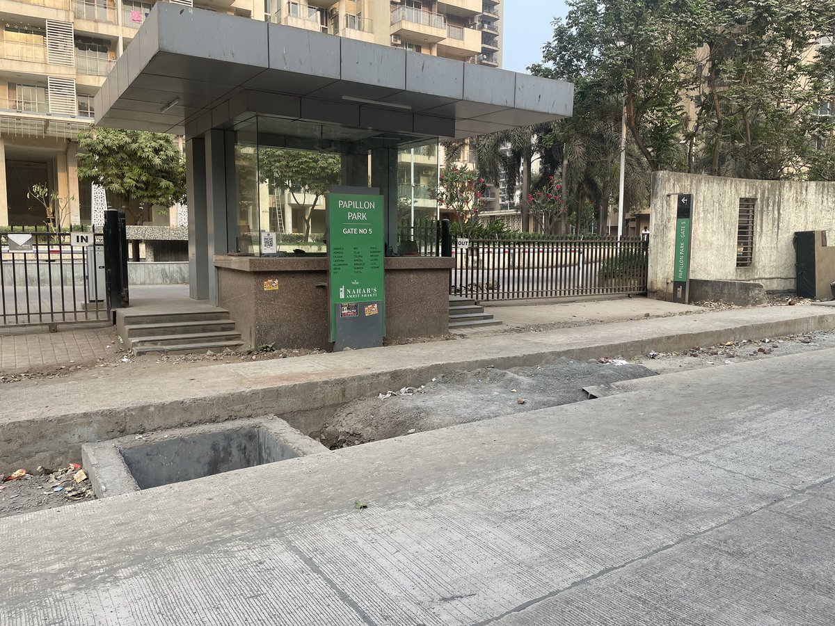 AbbeeTheAviator's tweet photo. @mybmc @mybmcWardL The  road outside Nahar Amrit Shakti is mow@operational. However, they have left a deep ditch that does not allow residents of the complex to exit this gate.Who is responsible to fill this? When will it be done? https://t.co/5q22wyObIs