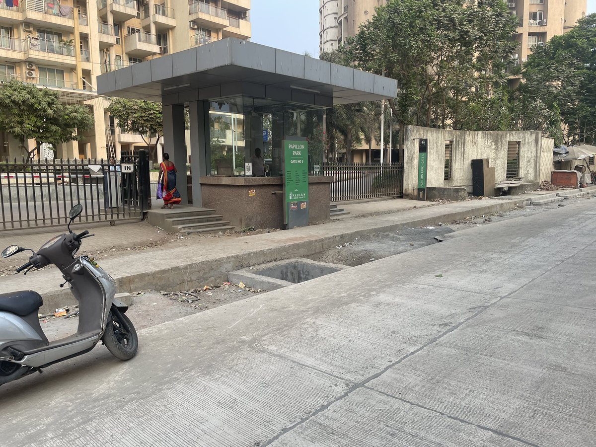 AbbeeTheAviator's tweet photo. @mybmc @mybmcWardL The  road outside Nahar Amrit Shakti is mow@operational. However, they have left a deep ditch that does not allow residents of the complex to exit this gate.Who is responsible to fill this? When will it be done? https://t.co/5q22wyObIs