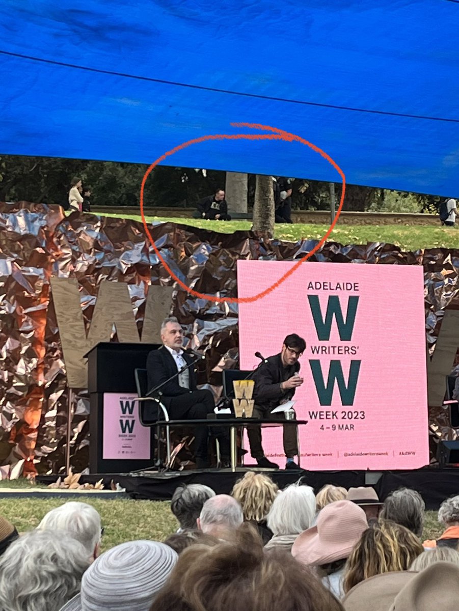 #AdlWW . Cops surrounded a bloke just above the stage. A critic of #Putin is about to speak. Glad to know that security is mindful of talks such as this.