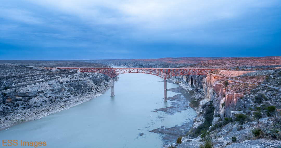 On the way out to the Big Bend Country, I stopped by my favorite bridge.  The US90 highway bridge over the Pecos was lovely as usual.  The sun peeked through a gap under the clouds just before sunset!

#igtexas 
#texas #transpecos
#pecosriver #us90 
#sunset #clouds