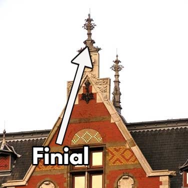 Finial: any decorative element at the very top of a structure, such as a dome, tower, or roof.