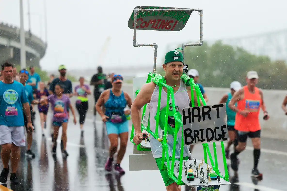 CareyHepler's tweet photo. @LentilTweetz Thanks Janie.  This is my favorite pic from the race.  Finishing in the rain! https://t.co/xJw8X8rWLS