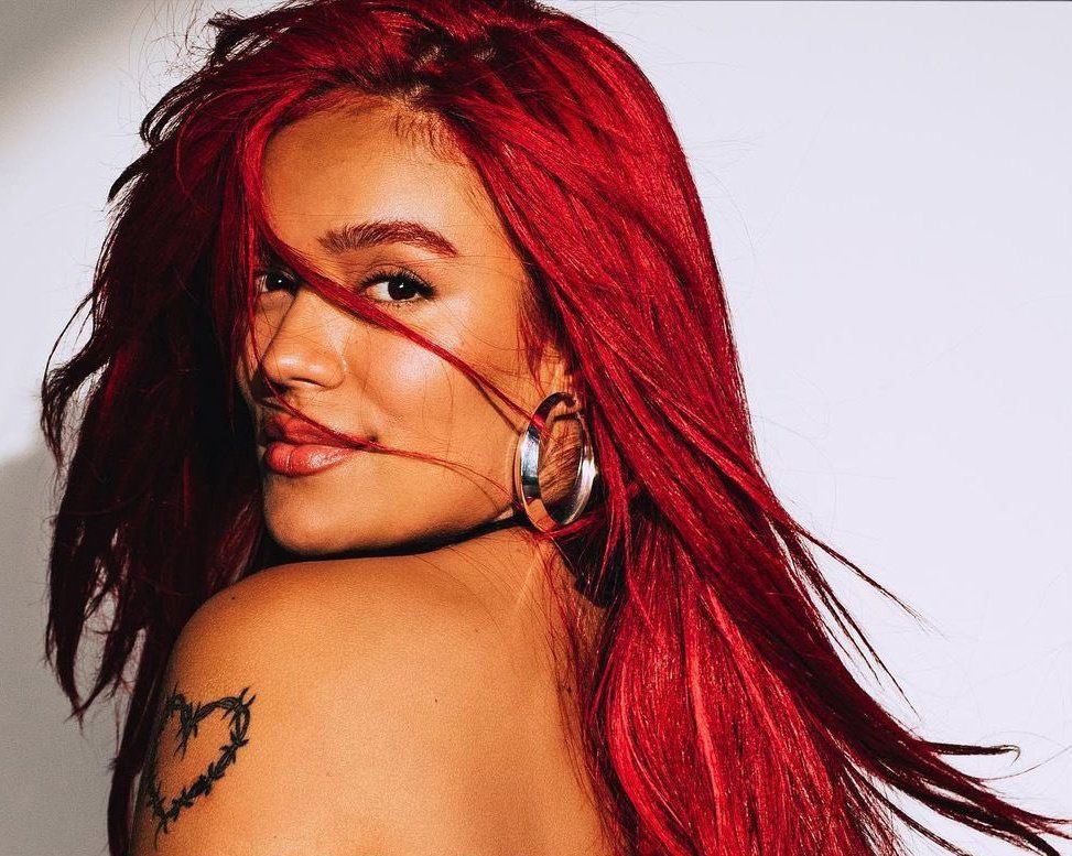 KarolGStats's tweet photo. .@KarolG becomes the first woman in history to earn a #1 album in the US with an all-Spanish language record. https://t.co/Wrnvgcgn4N