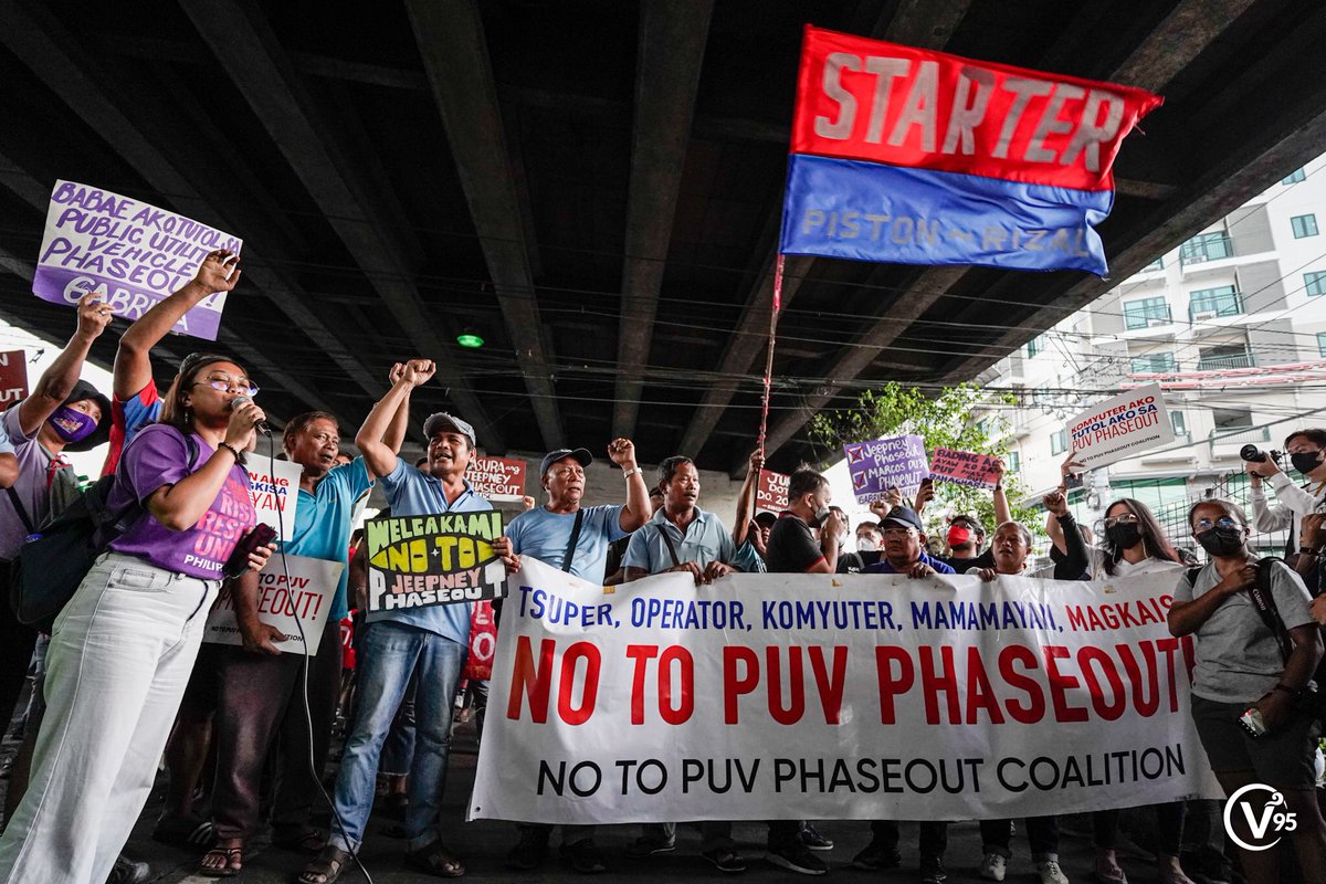 varsitarianust's tweet image. Various transport groups and progressive organizations stage a protest against the jeepney modernization program on the first day of the week-long transport strike at the Katipunan Avenue Bridge on Monday afternoon.

(Photos by Joselle Marie B. Reyes/ The Varsitarian)