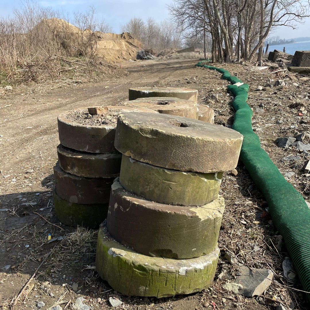 RiverfrontNorth's tweet photo. #MotivationMonday - Making progress on the K&amp;T Trail extension in Tacony along the riverfront in Northeast Philly. Our crews found a lot of discarded millstones from the old Tacony Saw Works factory... 

#tacony #northeastphillylife #delawareriver #phillytrails #riverfrontnorth https://t.co/6JxwElslhr