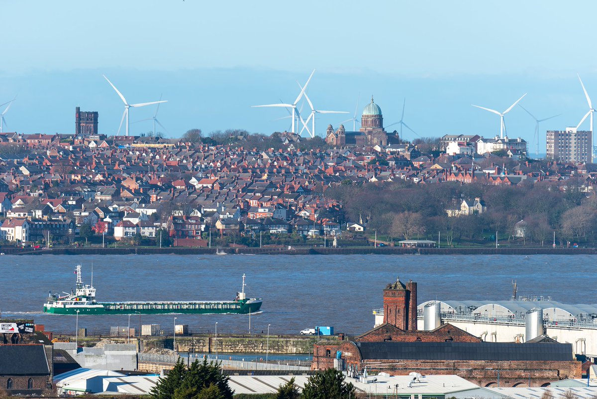 Views from #Liverpool, across the Mersey to New Brighton. The octagonal Gorsehill Water Tower on the left and the wonderful Ss. Peter & Paul and St Philomena Church aka 'Dome of Home.'