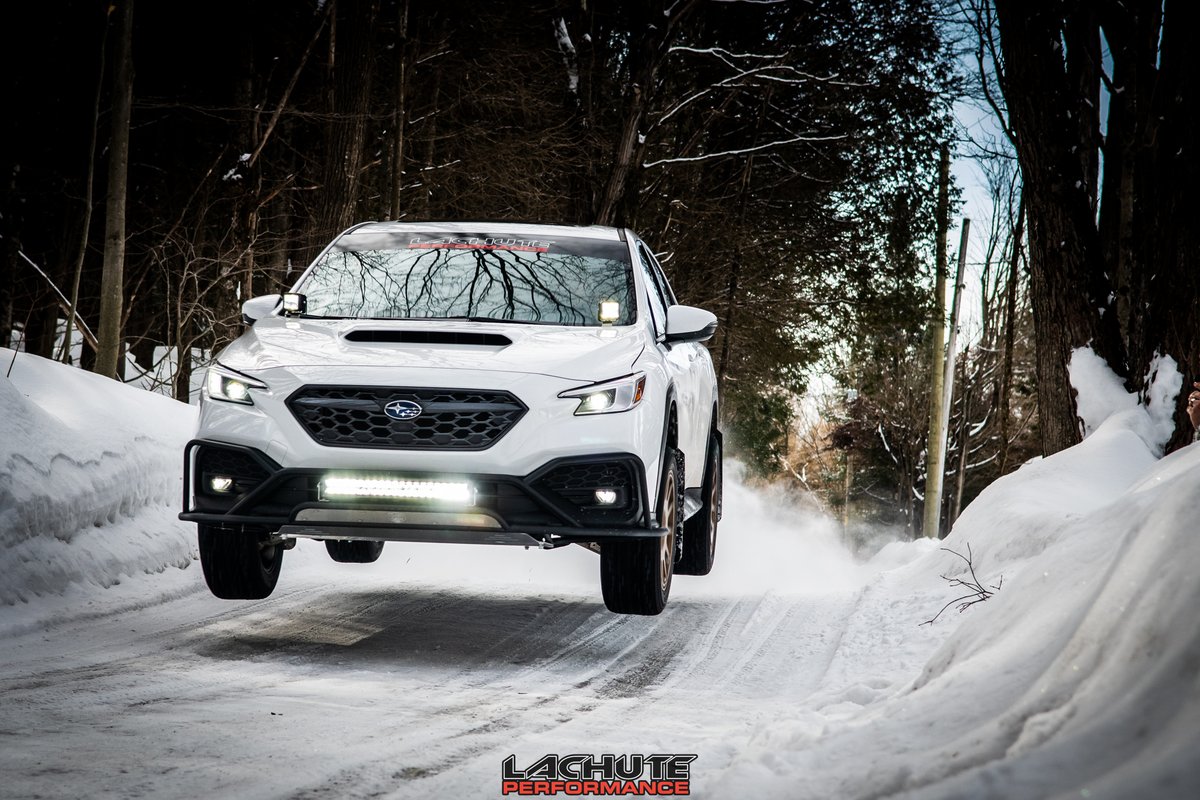 LP_Aventure's tweet photo. Our 2022 Subaru WRX project car. Featuring our lift kit, Bumper Guard, Skid Plates, Wheels, Hood light brackets and a cat back by Lachute Performance.  #lpaventure #subaru #subaruwrx #wrx #wrx2022 #liftedsubuaru https://t.co/gnclmwQY9x