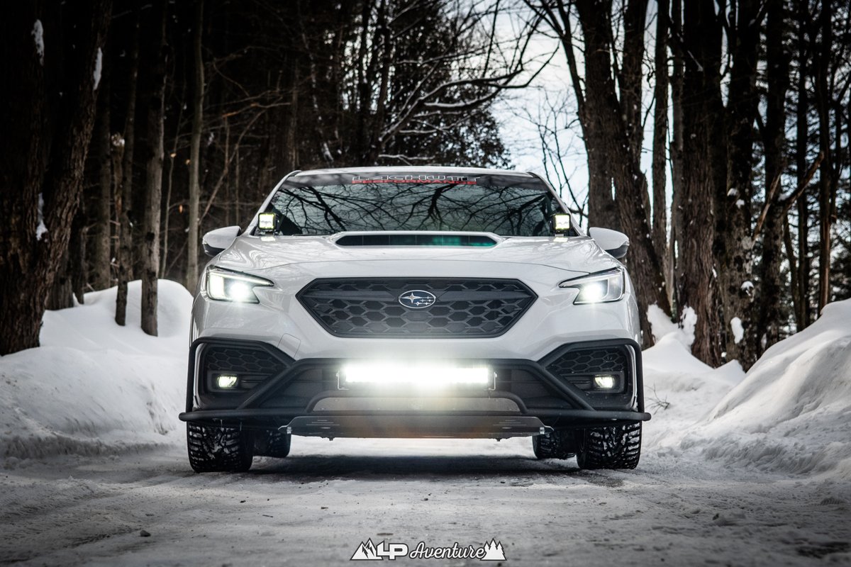 LP_Aventure's tweet photo. Our 2022 Subaru WRX project car. Featuring our lift kit, Bumper Guard, Skid Plates, Wheels, Hood light brackets and a cat back by Lachute Performance.  #lpaventure #subaru #subaruwrx #wrx #wrx2022 #liftedsubuaru https://t.co/gnclmwQY9x