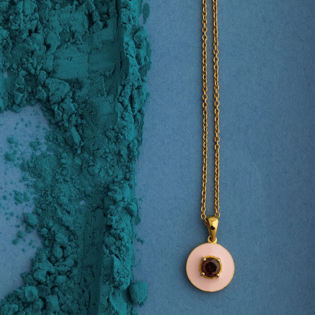 Pretty in pink! This dainty pendant is one of our favourites. 
The enamel's pink hue beautifully compliments the garnet's deep tone. Pop it on for a dash of understated elegance.

#pinkenamel #enamel #garnet #cocreatestyle #cocreate #holi #holicelebration #popcolor