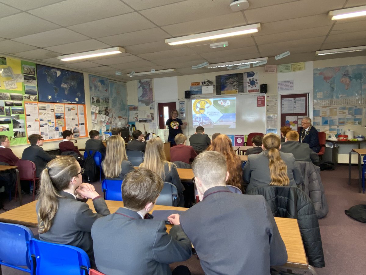 PHS_Geography's tweet photo. 9B Geographers welcomed @DenbighshireCC to our lesson today to award James the prize for winning the KS3 ‘Postcards from the Future’ competition. We listened to the role of the council and how it is addressing the #climatechange emergency @PrestatynHigh @phshomecoming da iawn https://t.co/FIztsXabhf