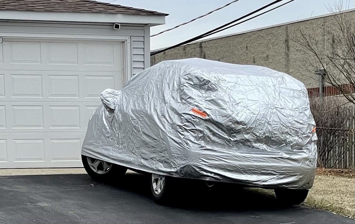 Identify this vehicle: #MysteryRide #CarCover