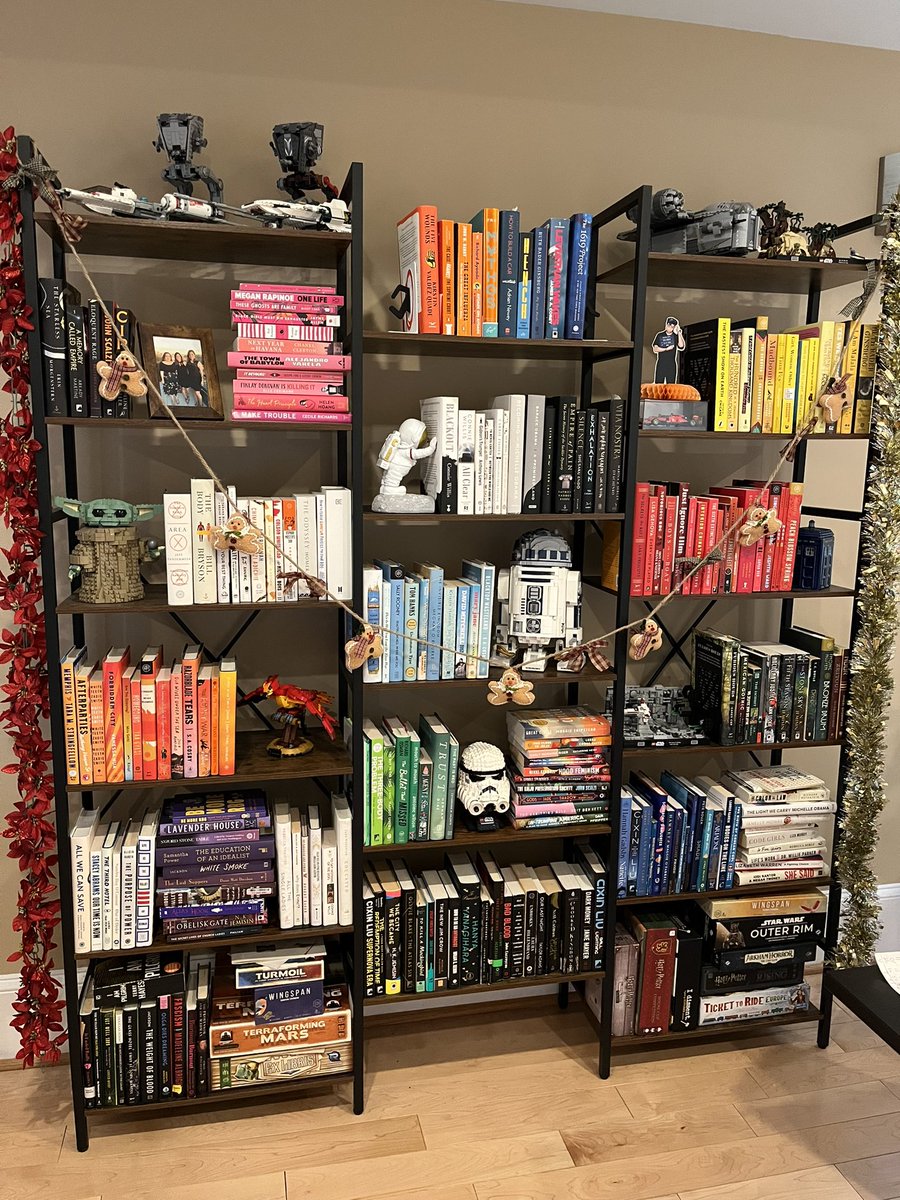 alphabetdip's tweet photo. @maureenjohnson I like to pull the first of the series for this bookshelf and keep the rest in another bookshelf. I also know where all the books are here better than my other bookshelf because I know the colors well! It brings me IMMENSE joy. https://t.co/SvJKQ6s2OY