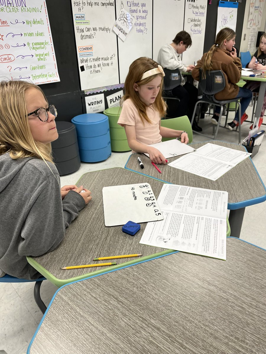 Students collaborating with their peers to demonstrate their learning to answer questions about matter! #matteriseverywhere #theMESway #AVIDatMESI