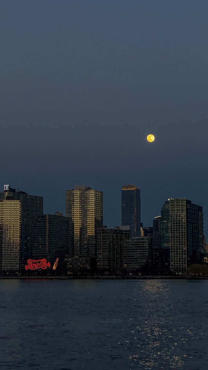 Near full moon over LIC