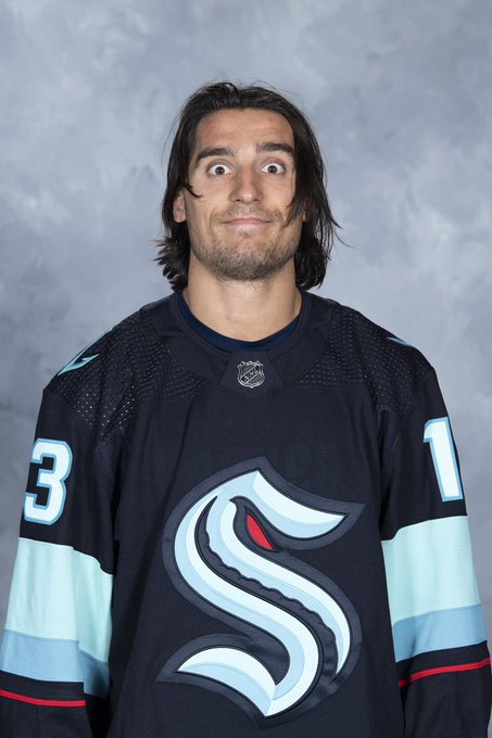 Brandon tanev's headshot in which he's making a face like he saw a ghost