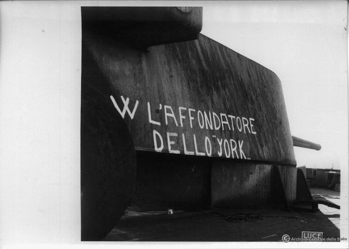 CiarliniKoerner's tweet photo. I think this classifies as gloating.

An Italian inscription on a turret of the sunken cruiser HMS York at Souda Bay, summer 1941.

[Source: ACS]

#RoyalNavy #RegiaMarina #ItalianNavy #WW2 #WorldWarII #HMSYork https://t.co/fCG4HD74Ah