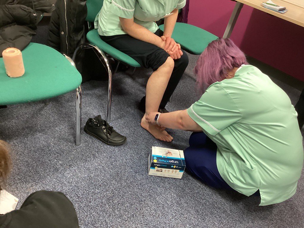 DNELHT1's tweet photo. Some of our fabulous HCAs continuing to develop their knowledge and skills, applying compression bandaging following their training ⭐️ @Cicdivision @ELHT_NHS @emlucja @forrestcdmiim @Polly_DNs_EL https://t.co/dGmdfUPcjj