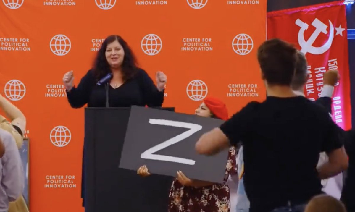 GrandTurion's tweet image. They misspelled "spreading the #warmonger, #prowar, #progenocide, #proaggression, #antilibertarian message at the #ProWarRally #WeLovePutinRally". Honest mistake I'm sure.