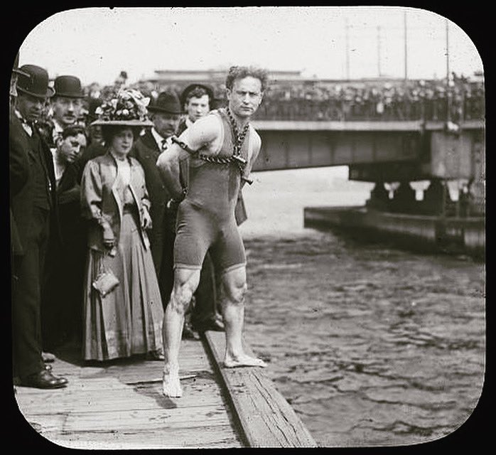 #Houdini ready to perform a manacled jump from Harvard Bridge in #Massachusetts, followed by an under-water escape in the Charles River. These jumps, along with his upside-down straitjacket escapes, drew large crowds and publicized his stage appearances. April 30th, 1908.