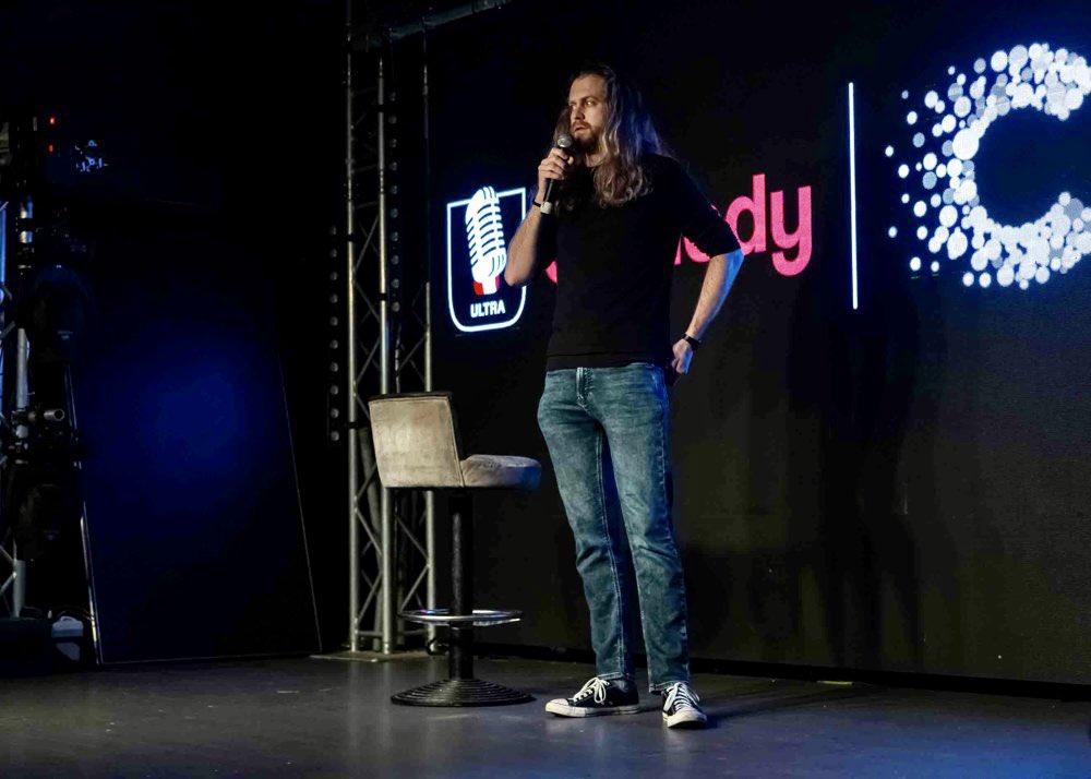 tbmlaughs's tweet photo. Finally sharing photos from my @UltraComedyUK experience back in December. Met an amazing bunch of new comedians and received fantastic tutoring from @sarahbennetto 

Final performance was in front of 120+ people. It was electrifying and still the biggest crowd I’ve played to. https://t.co/ibcx5kBuzK