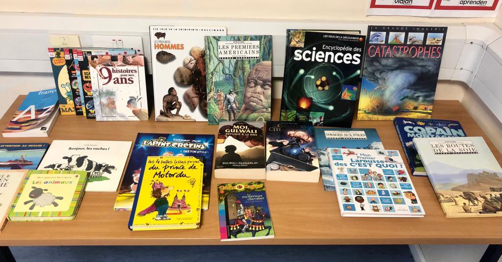 sra_mfl's tweet photo. Our French library is growing! Thank you to the SRA community for your donations and to Madame Ifri for organising. #inspiringreadership #scholarlyhabitsofmind https://t.co/oteT9EZMWs