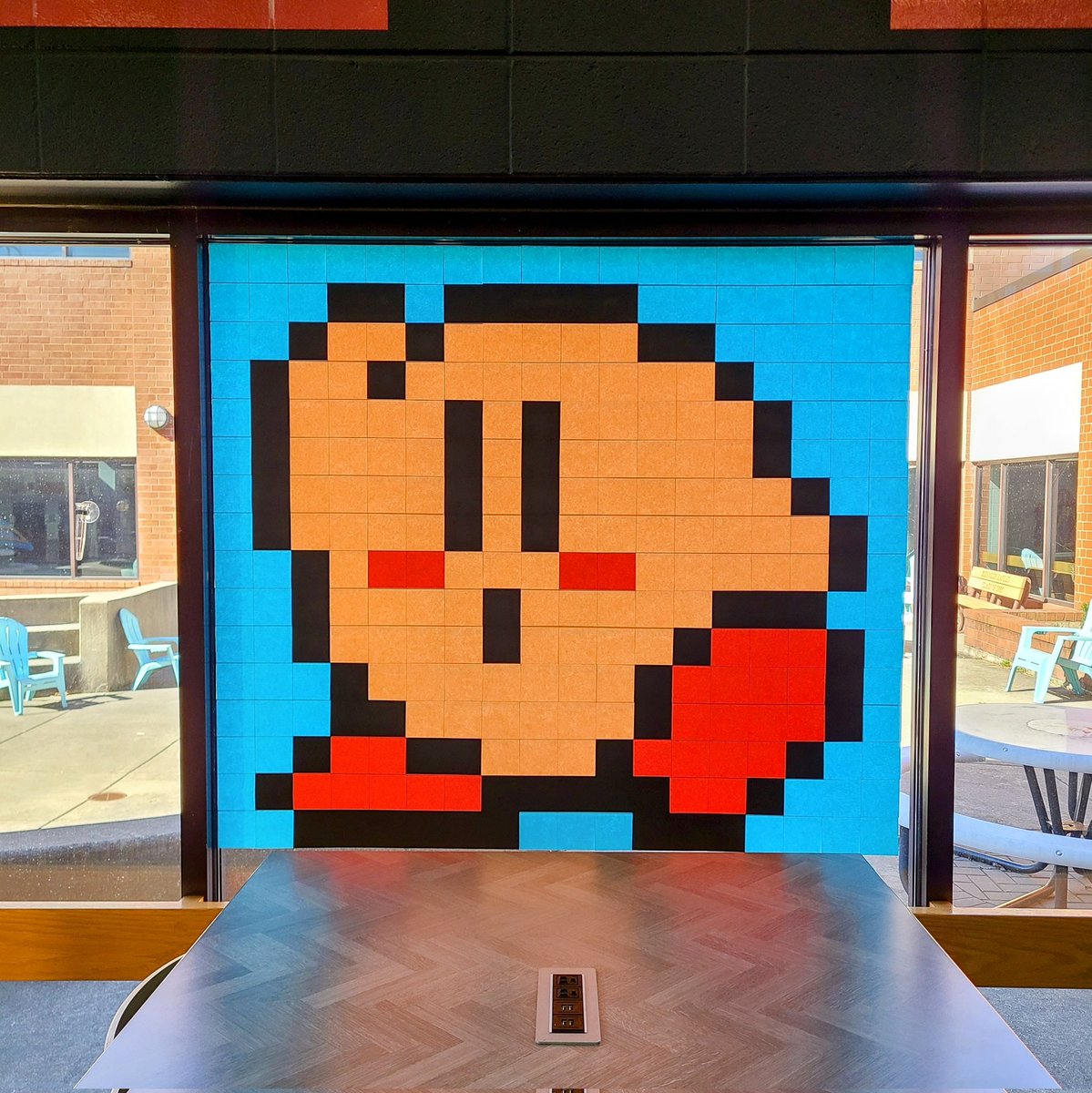 KJHSEagles's tweet image. Kirby's feelin' the energy in the school on this sunny day! #postitnotes mural #LearningCommons @NintendoAmerica @Kirby_JP @KirbyInformer