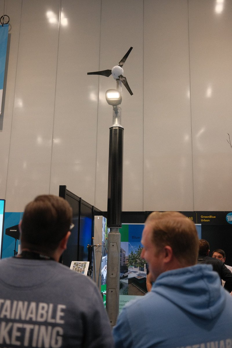 Look at the size of these off-grid streetlights on display from @GreenBlueUrban that combine solar and wind power! ☀️ 💨 ⚡️ 

#Futurebuild2023