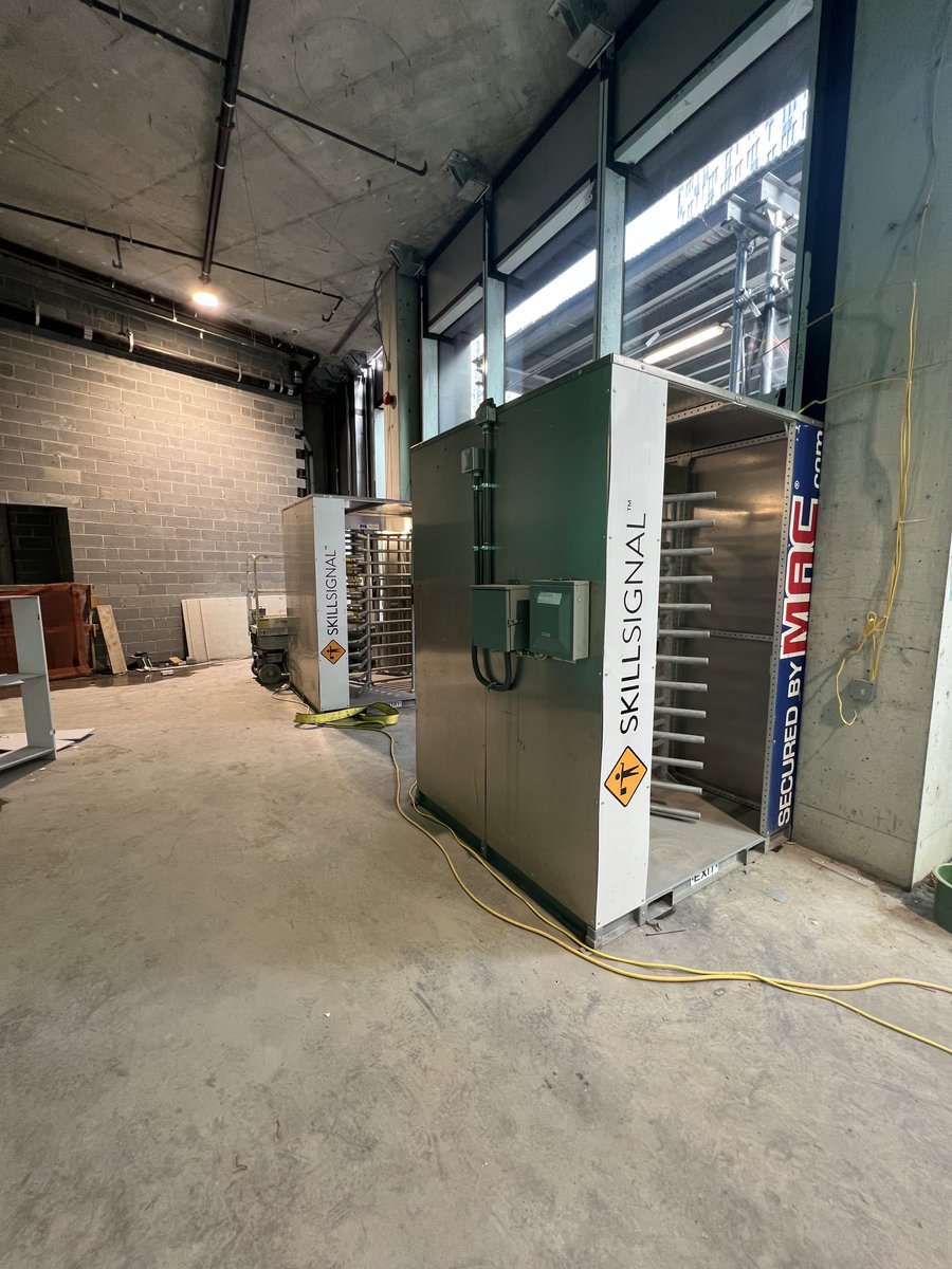 SkillSignal's tweet photo. Two lane turnstile delivered and live in Brooklyn! The team is getting ready for March 18th, the updated DOB SST deadline. 

Ensure you’re entire workforce is compliant and accounted for before they step foot on the project with SkillSignal. 

#construction #safety #nyc #brooklyn https://t.co/44IRR4RtK2