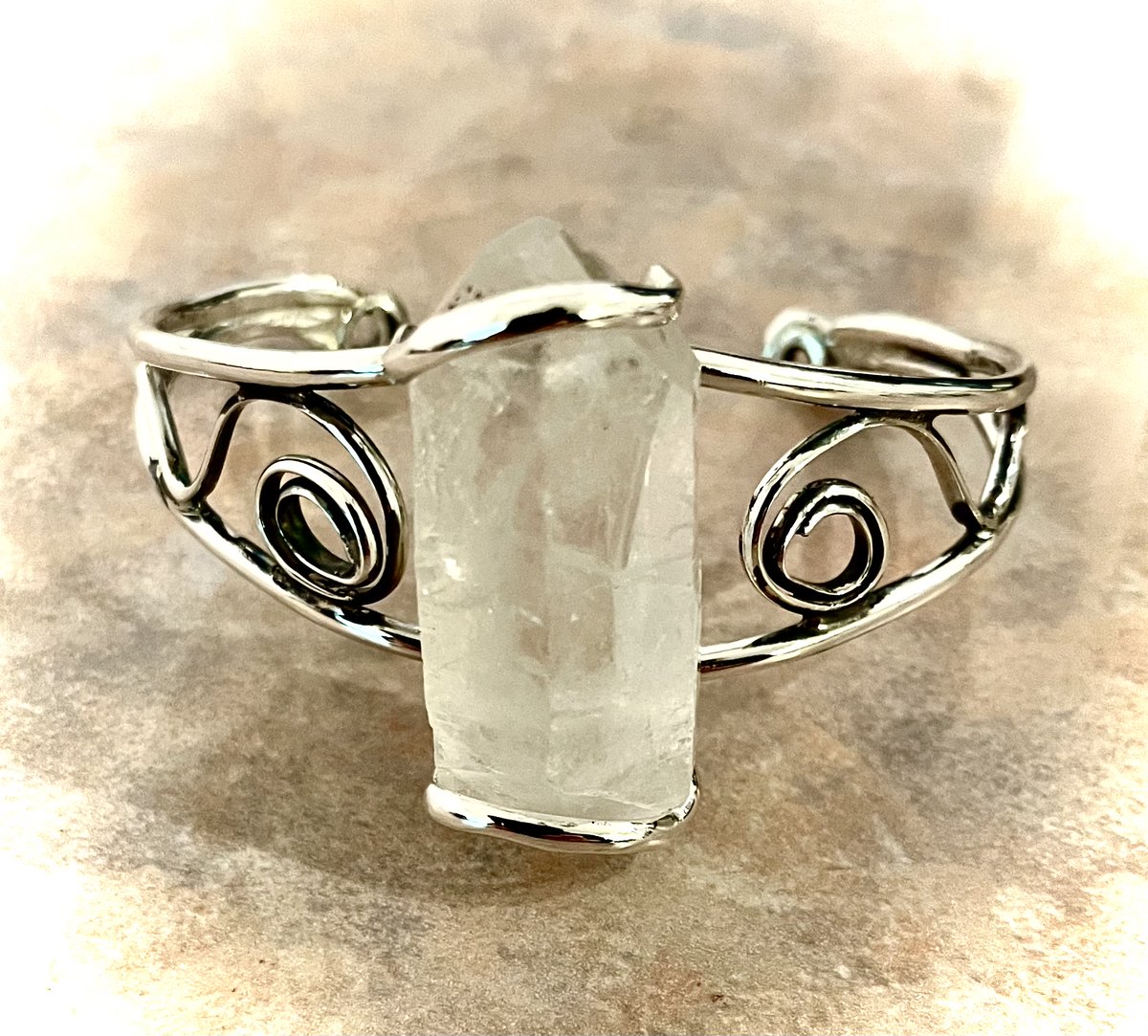 Natural quartz crystal power bracelet in sterling. Crystal is 1 7/8” height. Fits most wrists. $325. Will amplify your body’s energy and help channel energy through your hand chakras. #crystalhealing #crystalenergy #energyhealing #crystals #crystaljewelry