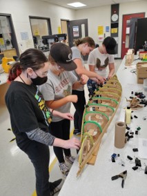 ugdsb's tweet photo. A group of nine female students at Guelph Lake Public School became the core group to take the bow and lead the STEM project of building a model size canoe. Read the full story here: https://t.co/Nm55XFTCEG.  #GirlsinSTEM https://t.co/LGCZPx94Sj