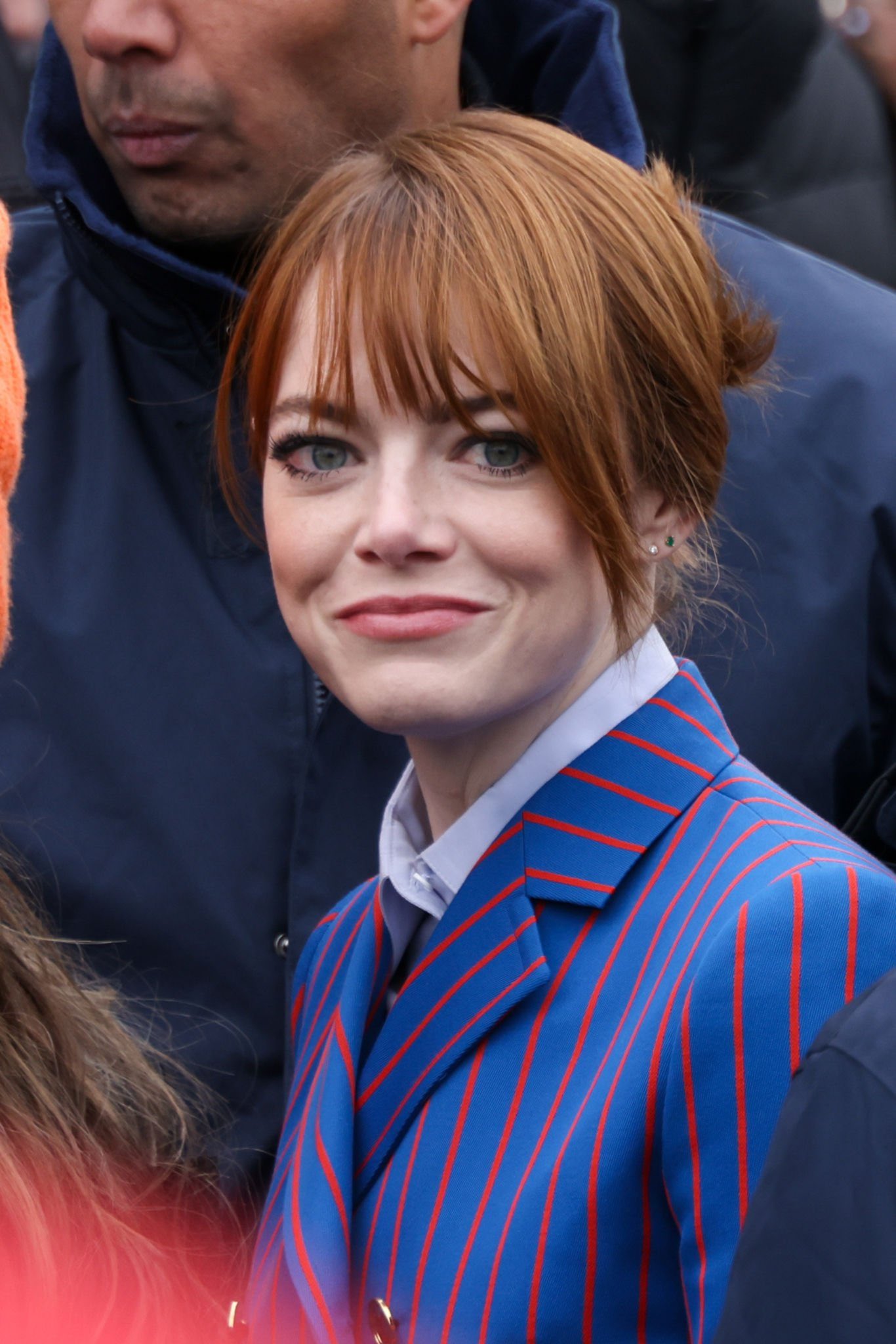 Emma Stone Suits Up in Striped Blazer at Louis Vuitton's PFW Show –  Footwear News