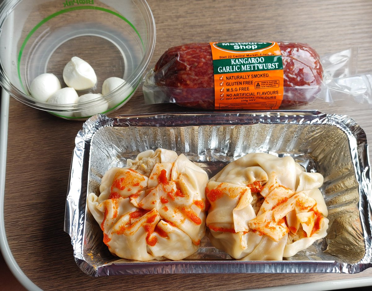 duffilled's tweet photo. Snacks from the #AdelaideCentralMarket, though I knew the #IndianPacific would keep me well-fed. The two chicken "dim sims" were fantastic. #dimsim https://t.co/7em7xBSKwC