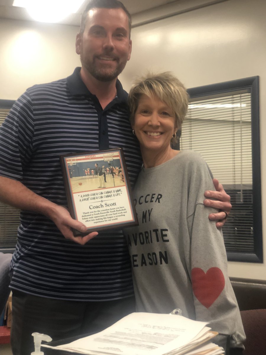 DarylChandler's tweet photo. A nice surprise visit from April Bean, one of our fantastic SoKno Jr Basketball coaches, bringing this plaque by and presenting it to @CoachDavidScott for his outstanding service to the SoKno community. #WellDoneCoach https://t.co/ZeILaDLfIW