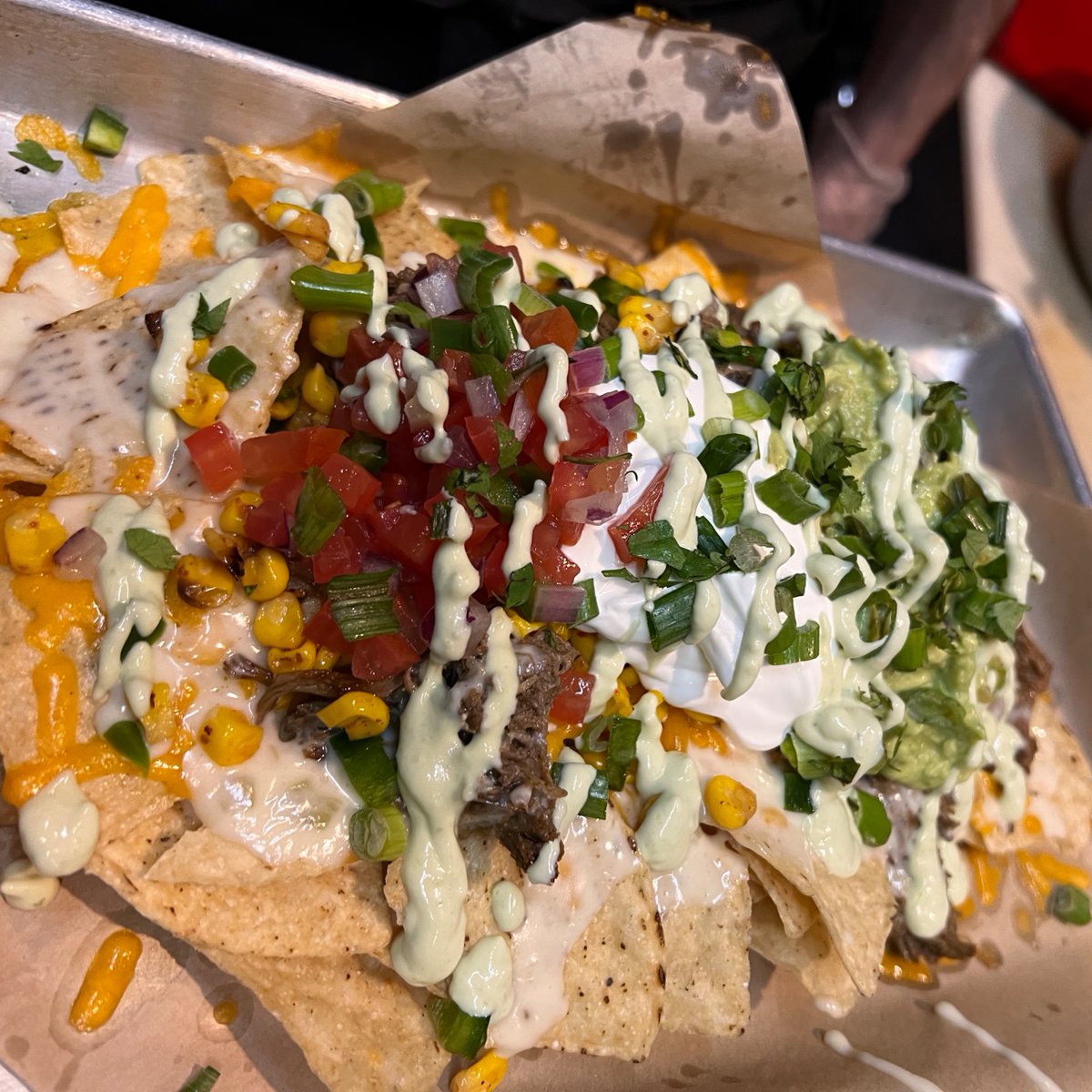 Nachos: A classic, loaded with all the goodness, share it, but only if you want to...
