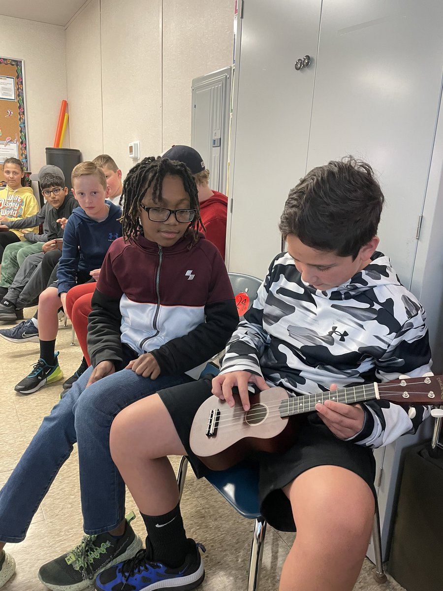 So glad to start ukulele! Helping each other identify the parts of the ukulele on our first hands-on day!
