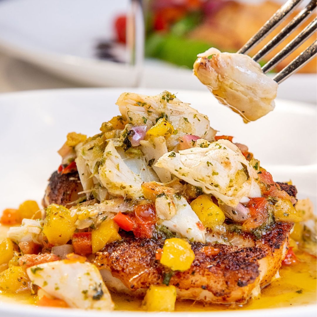 Grouper with fresh mango salsa and jumbo lump crab meat sautéed in cilantro-lime butter.
.
Dive into our Seafood nights at Mark’s Prime Steakhouse Ocala   For reservations visit marksprimesteakhouse.com/reservations/
#seafood #Dining #ocala