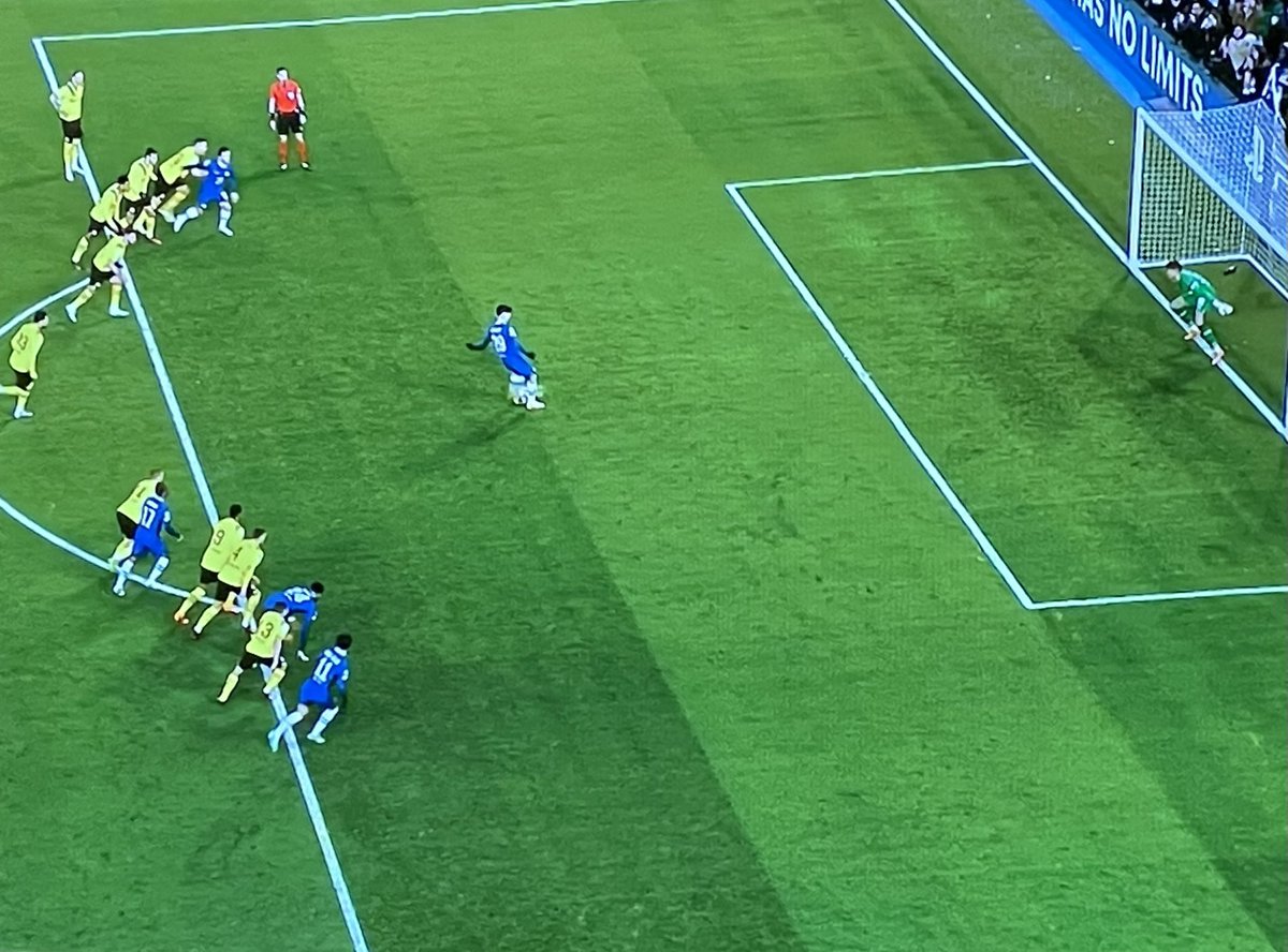 Yet another example of a badly redrafted Law of the Game. 
Three Chelsea players encroaching ahead of opponents, but because Dortmund players are also in the area VAR allows Chelsea a second chance to convert it dubiously awarded them. #CHEDOR