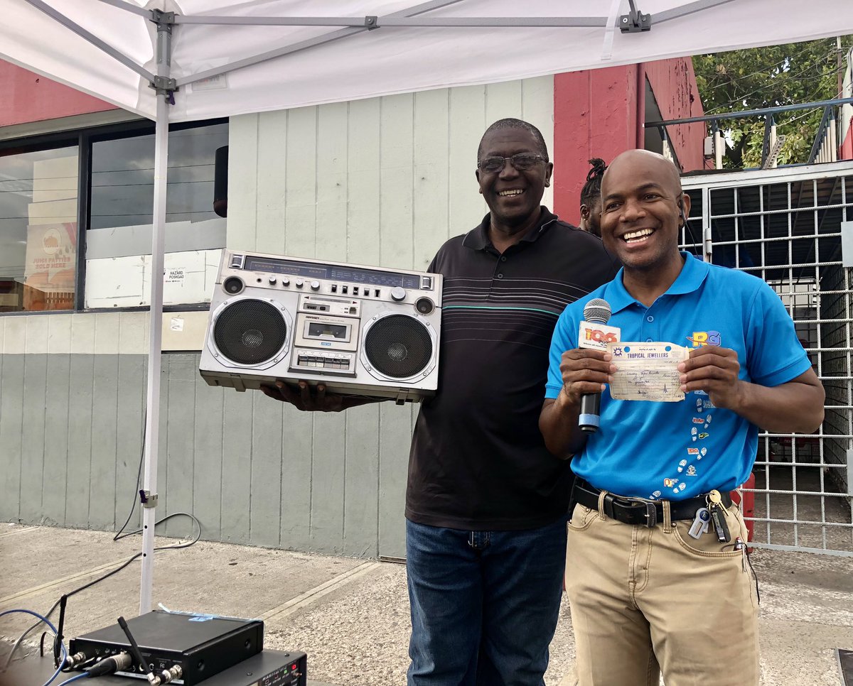DervanMalcolm's tweet photo. Derrick Bailey today paid us a visit at 96c Molynes Road at the intersection with Washington Boulevard and used the opportunity to showcase his 1986 Odyssey cassette player and radio combo  (Boom Box) which is still fully functional.  It cost him a princely sum of $1,425 Jamaican https://t.co/ToiGyIO4H7