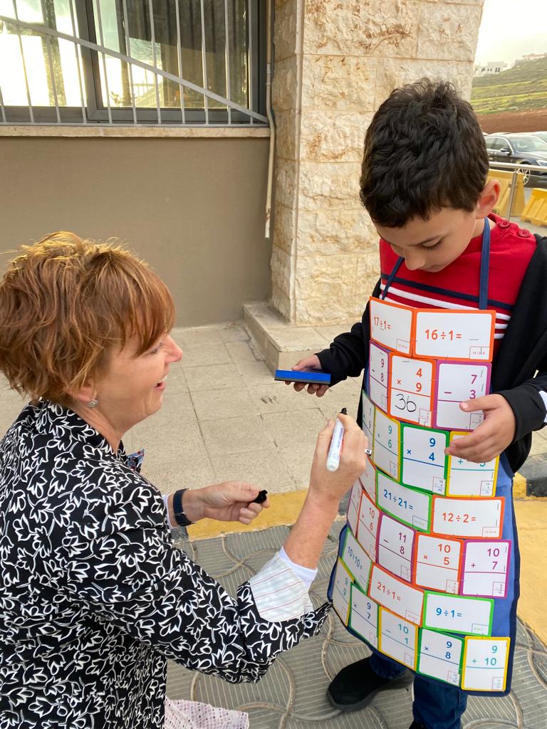 ICS_Amman's tweet photo. Celebrating #WorldMathsDay in style with interactive costumes like this one in #PrimaryICS. Stay tuned as today is packed with #MathsICS and #InternationalWomensDay activities from assemblies to competitions. https://t.co/CxxQre2GVb