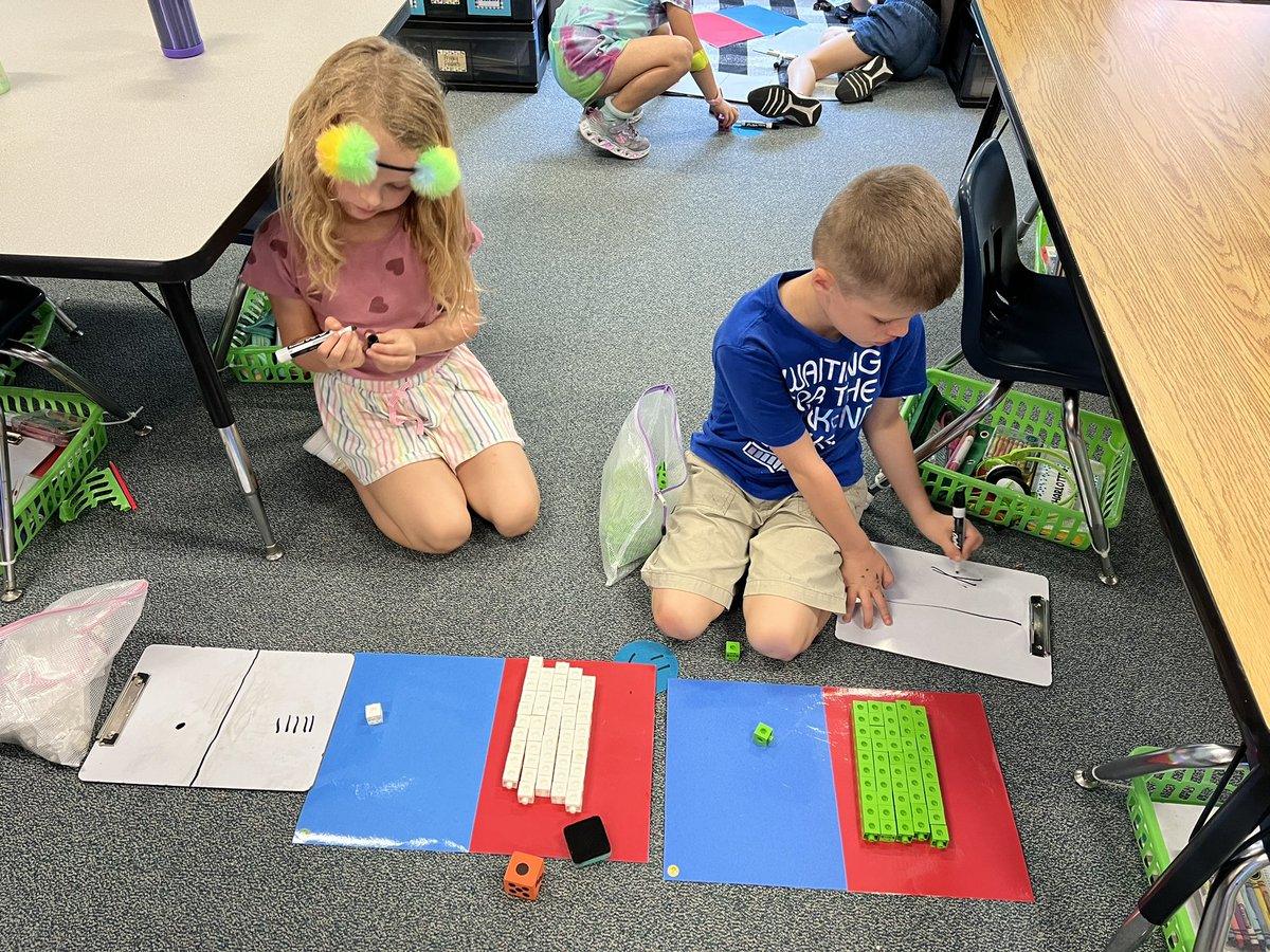 FPE1stGrade's tweet photo. We are LOVING place value! https://t.co/7eABetlhz3