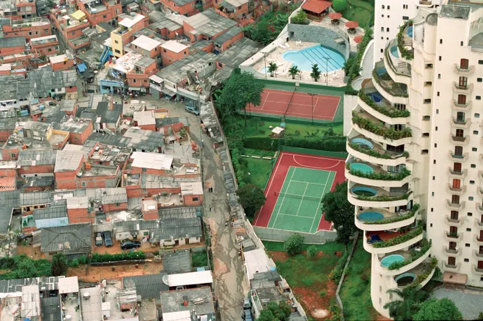 <a href="/Rothmus/">Rothmus 🏴</a> you know this is a parody based on this famous 2004 image of Sao Paulo, Brazil -- a capitalist country -- right?