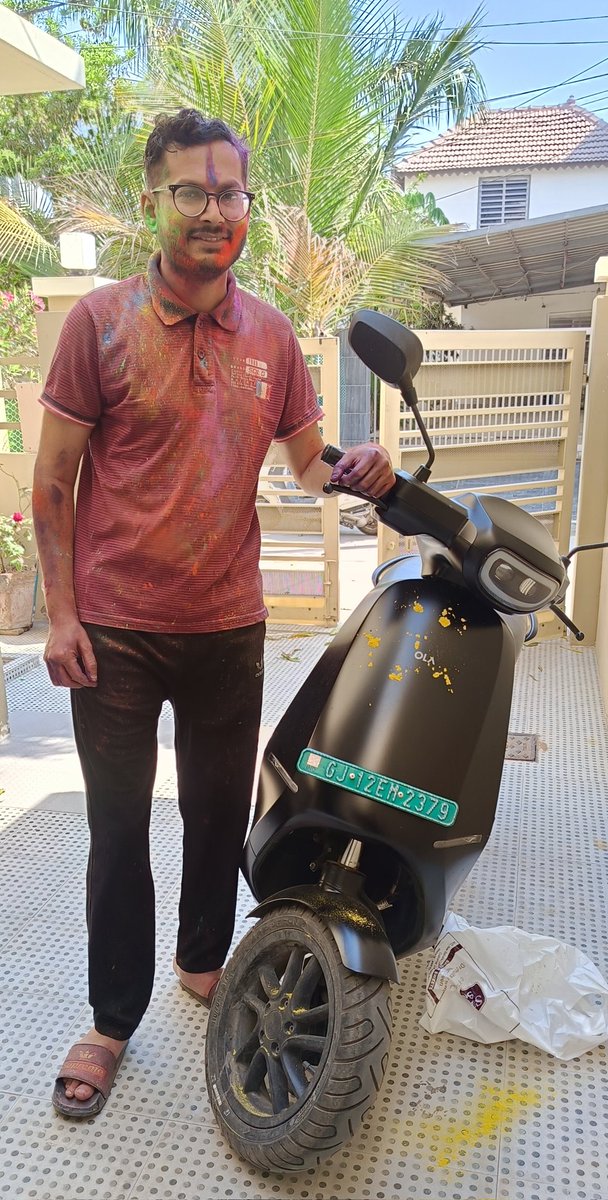 Though I can't see my Ola scooter get spoiled, so I played Holi gently with my Ola. Happy Holi. #ColourCharged