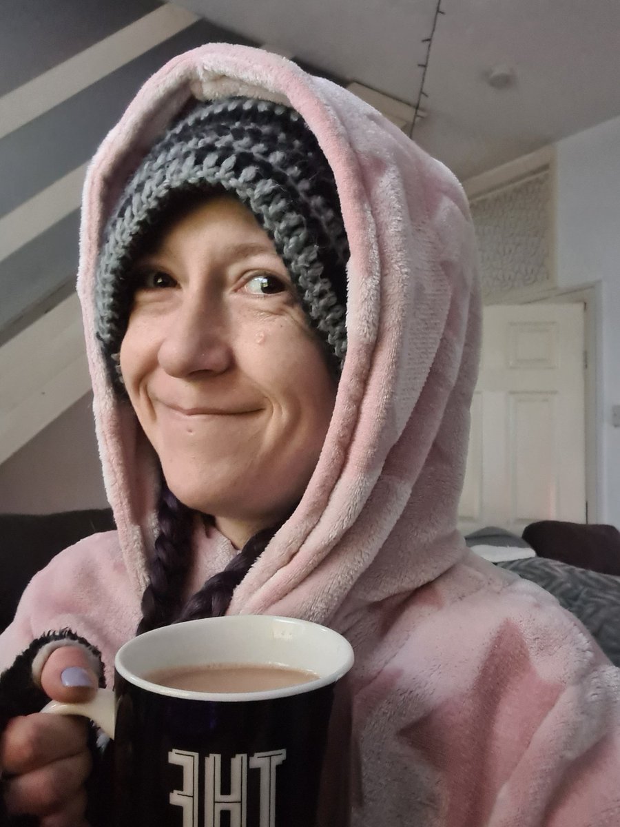 Kaz_DHD's tweet photo. I won't often share photos of myself, but this is me today. All day. Hiding from the snow with a huge cuppa (whilst fighting the urge to run outside and make snow angels/snowmen) Any good distraction tips out there so I don't make myself horribly unwell? 😂 #ADHDtwitter #ADHDasks https://t.co/Y6vwf2wl4w