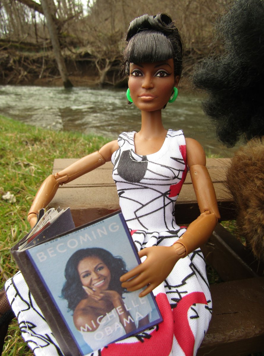 Uhura enjoys some Women's History Month reading by the Hungry Run Creek. #womenshistorymonth #uhura #barbie #dolls #dollcollector #michelleobama #womensrights #womensrightsarehumanrights #womensrightsmovement