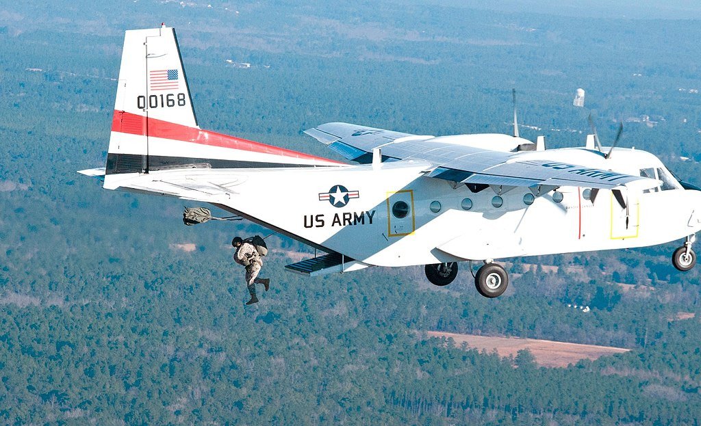 USASOAC C-212 conducting static-line parachute operations