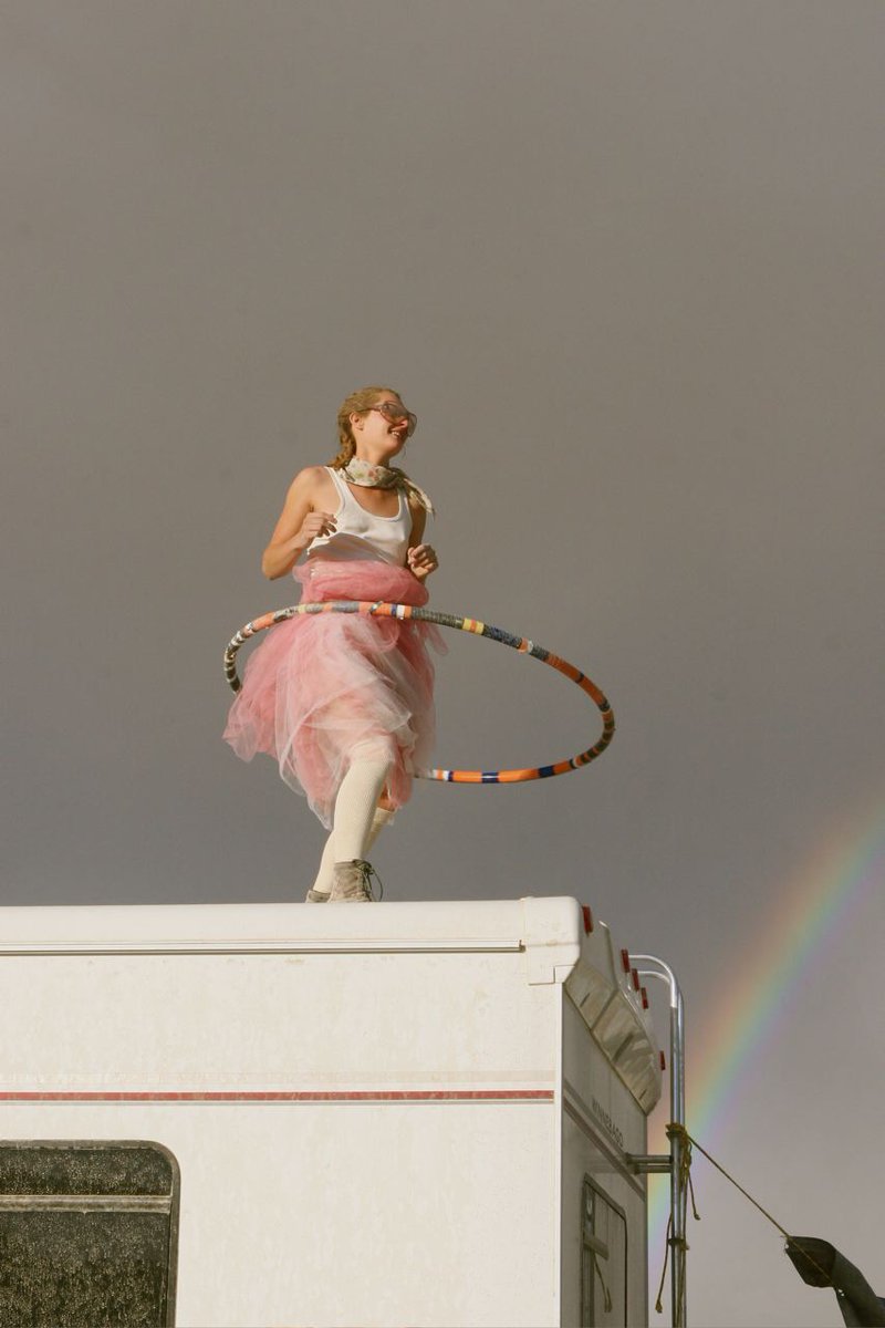 On #internationalwomensday here's a photo of a woman called Chelsea Piel doing a joyous hoop dance on a van roof.  Go out and do your own dance today, real or virtual, somewhere - anywhere.  It's our duty and our pleasure. #IWD
