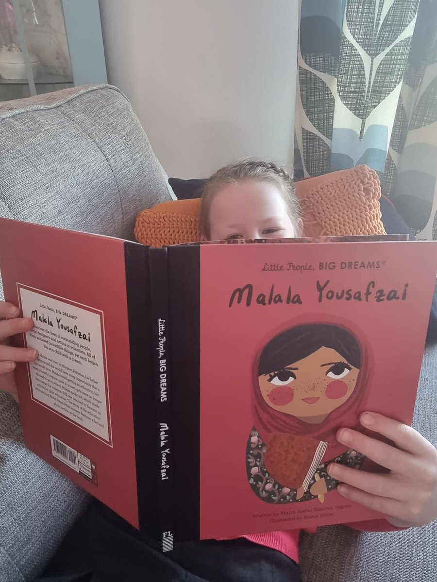 rbnadamson's tweet photo. O was lucky enough to be given new books for her birthday, she dived straight in to have a read about @Malala on #InternationalWomansDay for #BPSReading focus week https://t.co/iqhry2u8ie